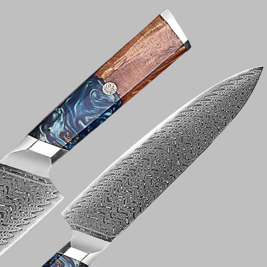 Decorative chef's knife with a wooden handle and patterned blade on a gray background