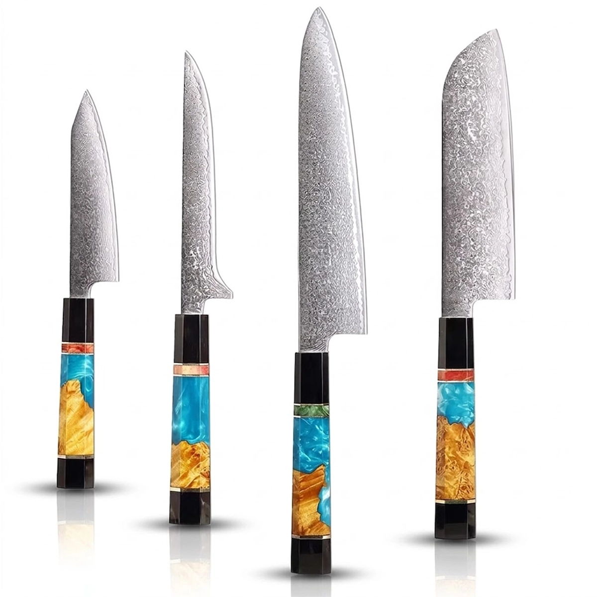 Set of four knives with decorative handles on a white background