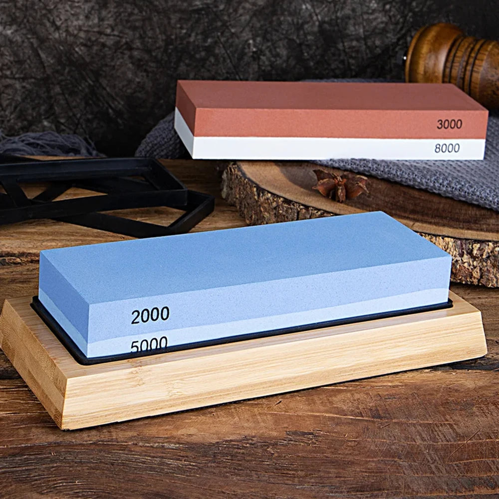 Two whetstones on a wooden stand with a dark background