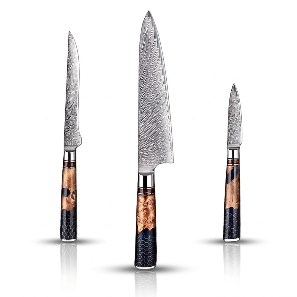 Set of three knives with wooden handles on a white background