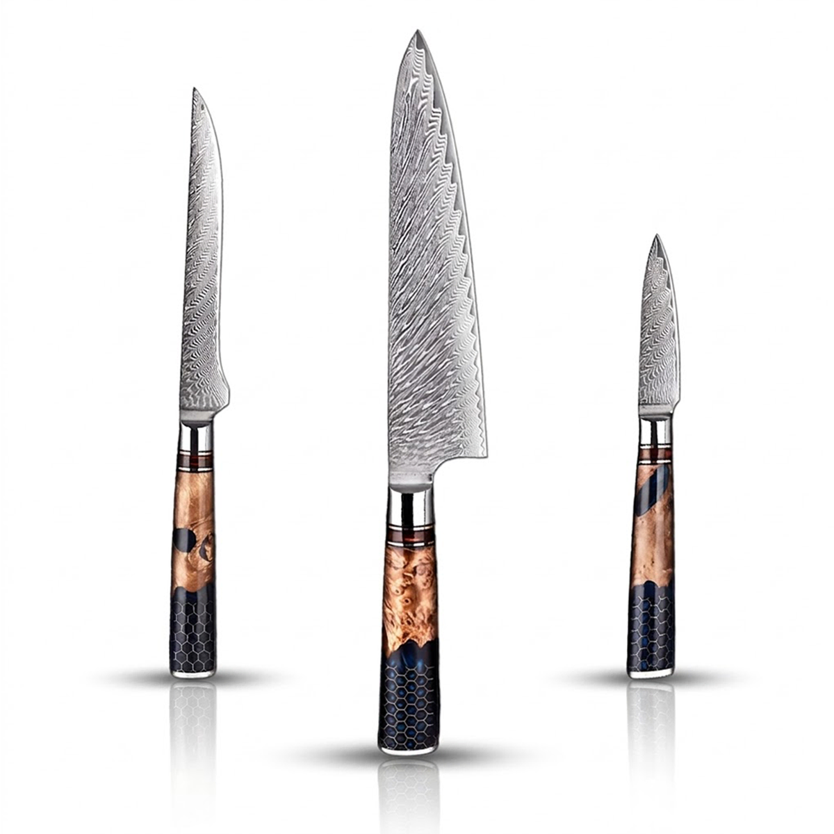 Set of three knives with wooden handles on a white background