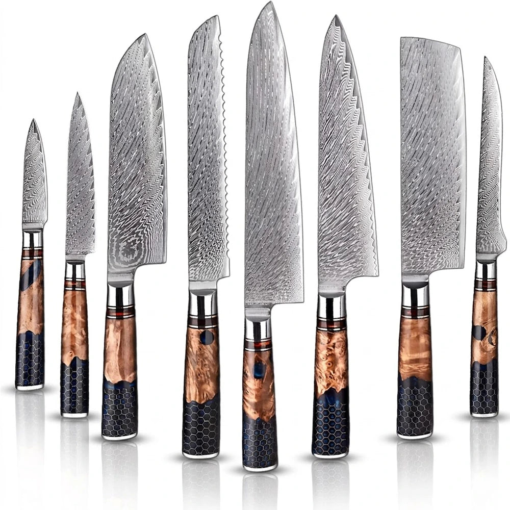 Set of Damascus steel kitchen knives with wooden handles on a white background