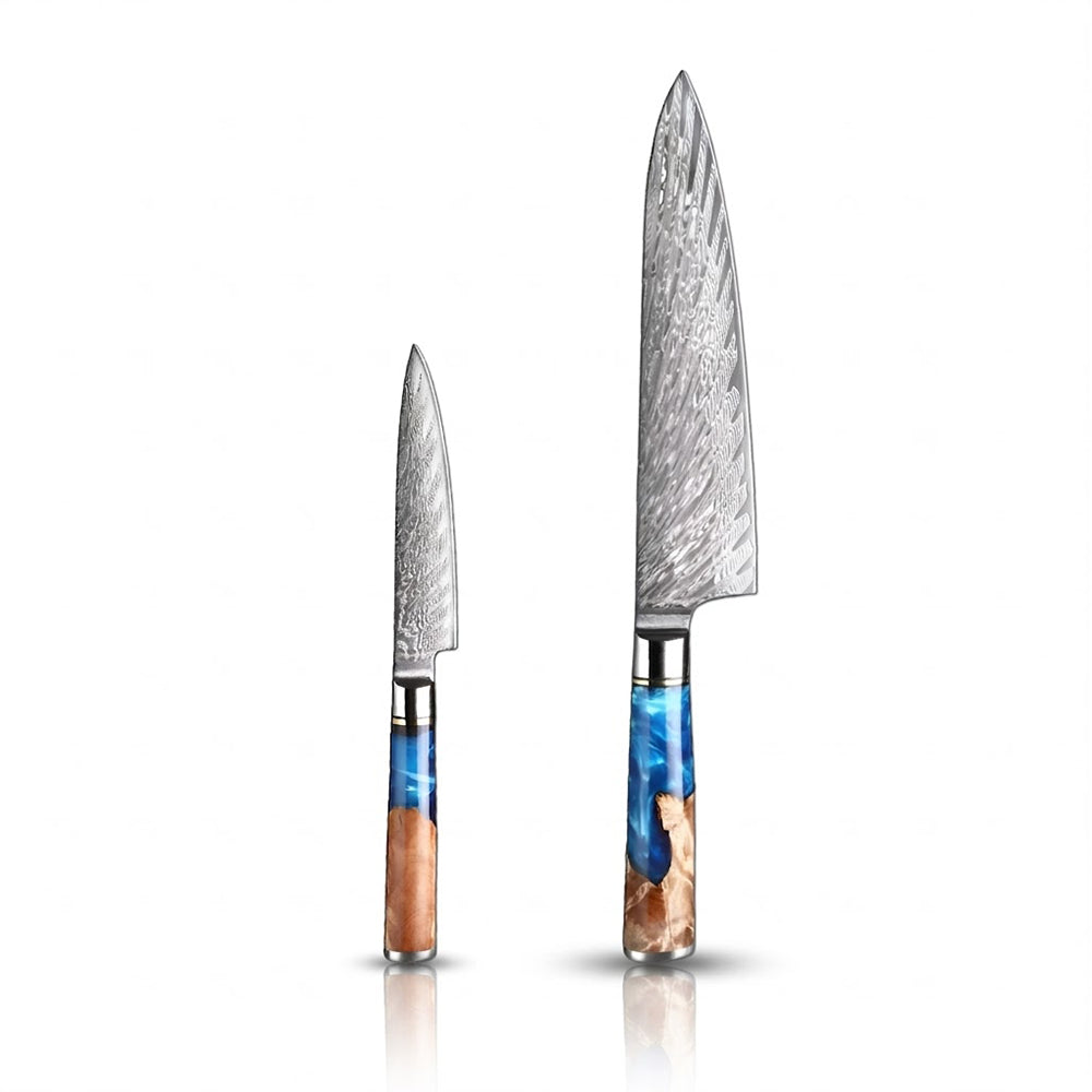 Two knives with decorative handles on a white background