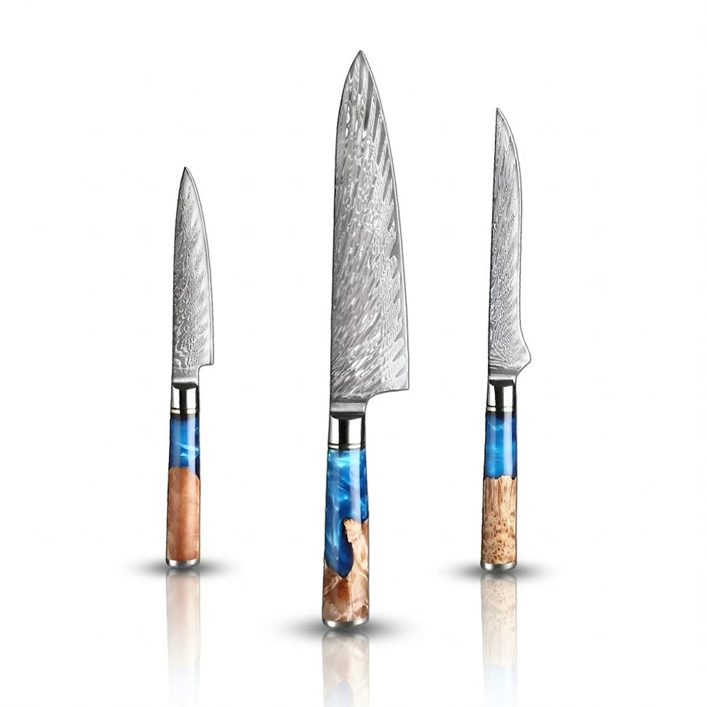 Set of three knives with Damascus steel blades and colorful handles on a white background