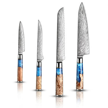 Set of four knives with decorative handles on a white background