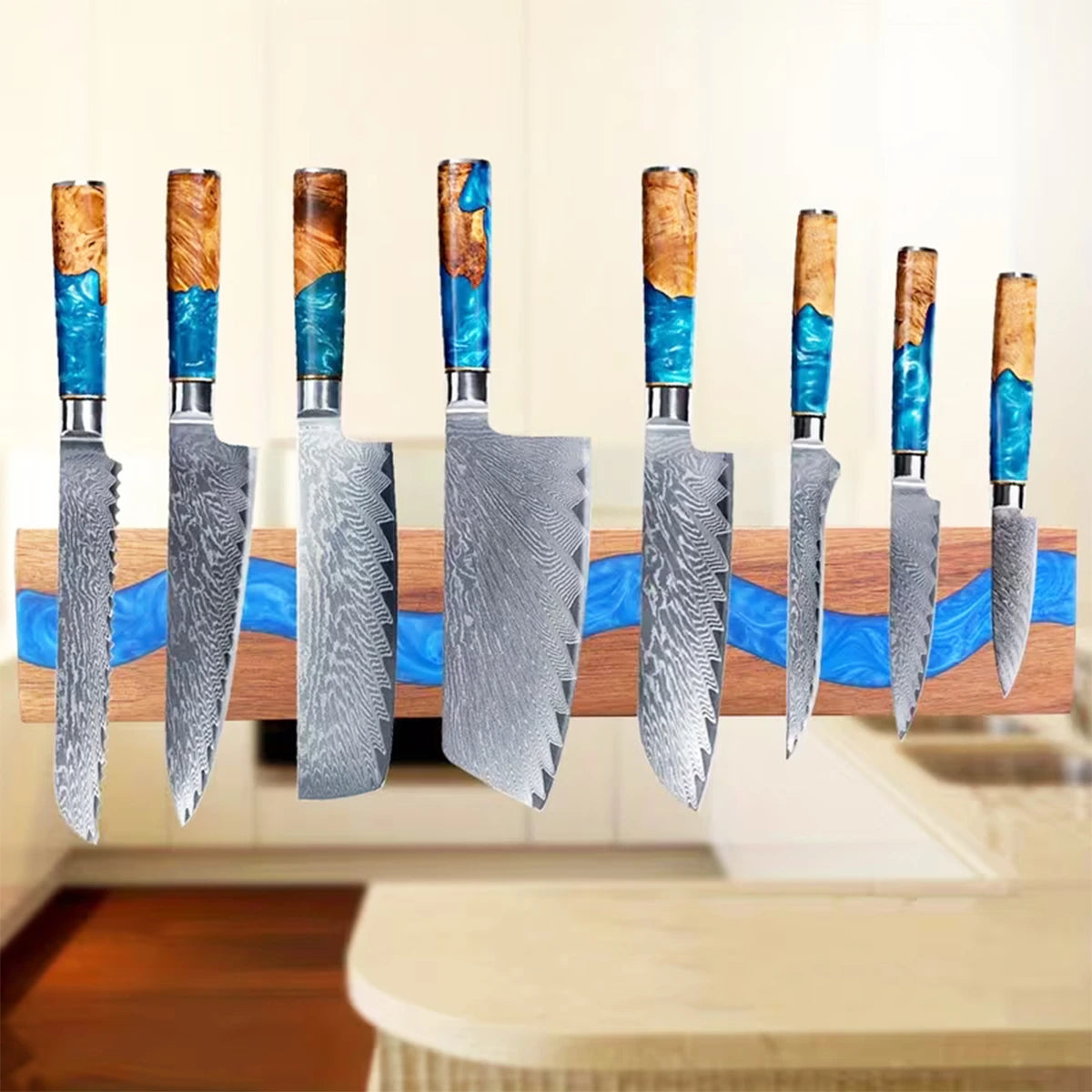 Acacia wood magnetic knife holder with blue resin river holding premium kitchen knives on a wall mounted magnetic rack