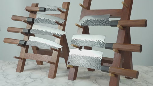 7-Piece VG10 Damascus Knife Set – Hammered Wooden Handle on a wood display