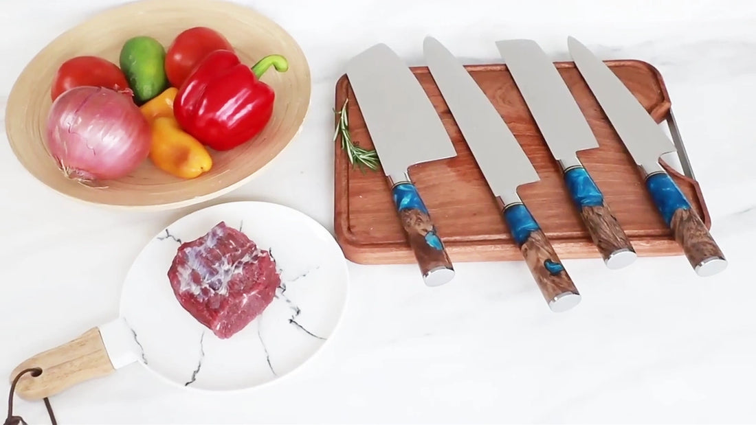 Japanese VG10 Damascus knife set with blue resin handles cutting food