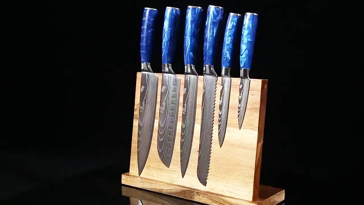 Load video: Video demo of 5 inch professional utility knife with blue resin handle and Damascus patterned blade for precision kitchen cutting tasks
