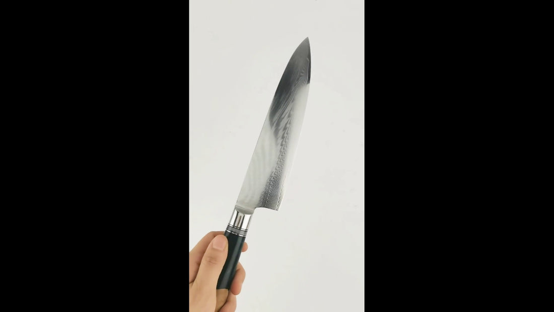 Video demo of 8 inch Damascus chef knife with stabilized green resin handle and ultra sharp textured blade for professional kitchen cutting and food preparation