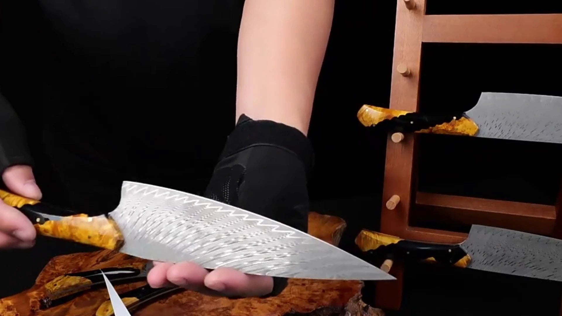 Load video: 5 piece damascus kitchen knife set with black and gold ergonomic handle showing sharp blades and premium design