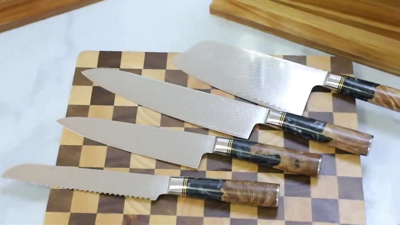 Cargar video: 9 piece damascus kitchen knife set with black resin handle showing sharp blades and premium design