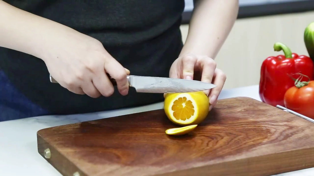 Video demo of 3 5 inch Damascus paring knife with red resin and wood handle for precise kitchen cutting tasks