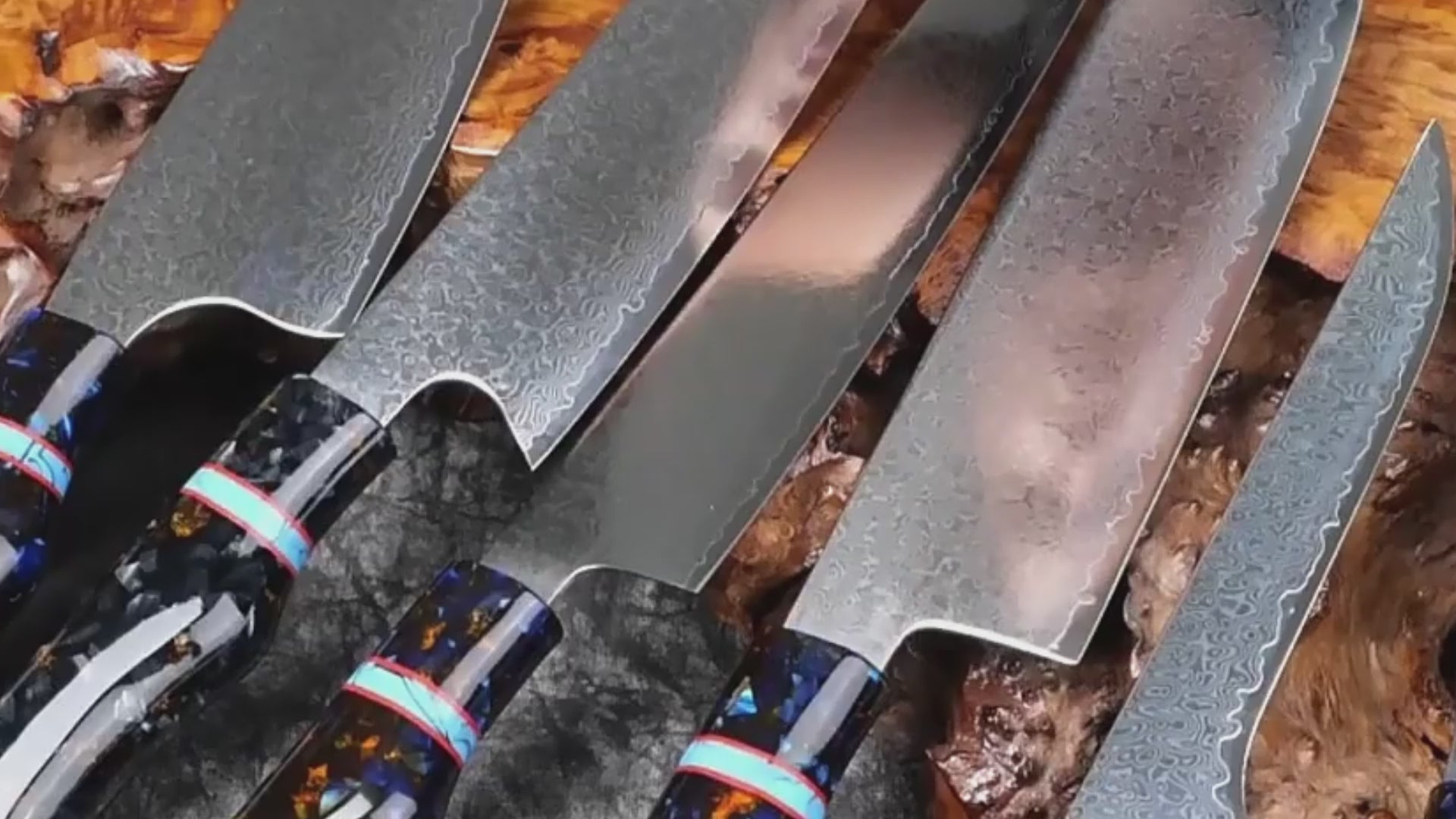 Load video: VG10 Damascus kitchen knife chopping vegetables with smooth, precise cuts and blue resin handle