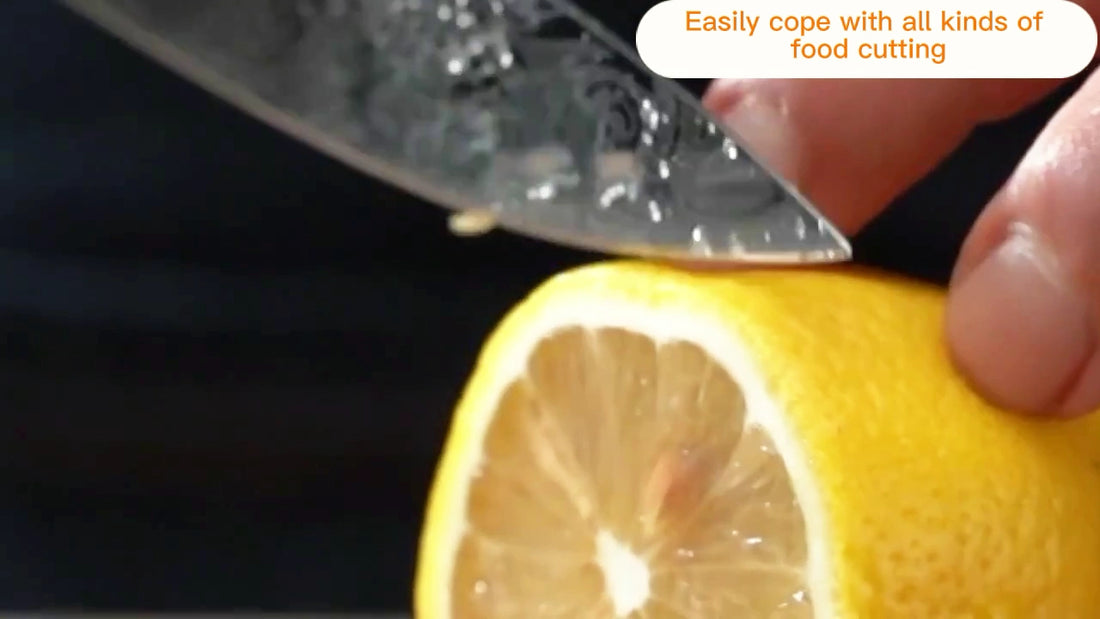 Video demo of 5 inch professional utility knife with green resin ergonomic handle and decorative patterned blade for precise kitchen cutting and preparation