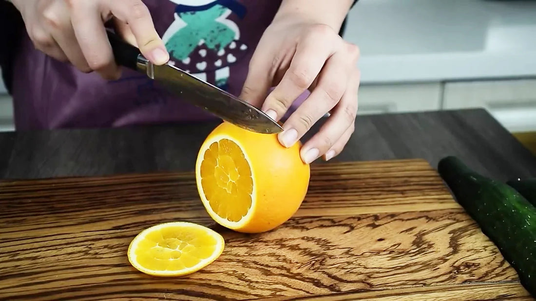 Video demo of 5 inch ultra sharp paring knife with black resin handle and Damascus style blade for detailed kitchen cutting and peeling tasks
